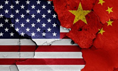 Flags of USA and China Painted on Cracked Wall | Chinese Consulate in Houston Shut Down | Featured