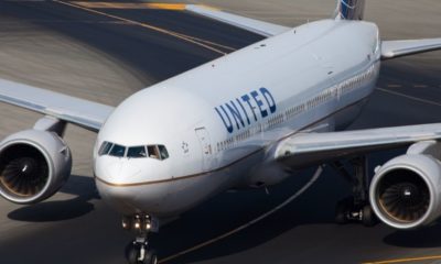 An American airline United B777 Plane | United Airlines No Longer Allows Face Masks with Exhaust Valves | Featured