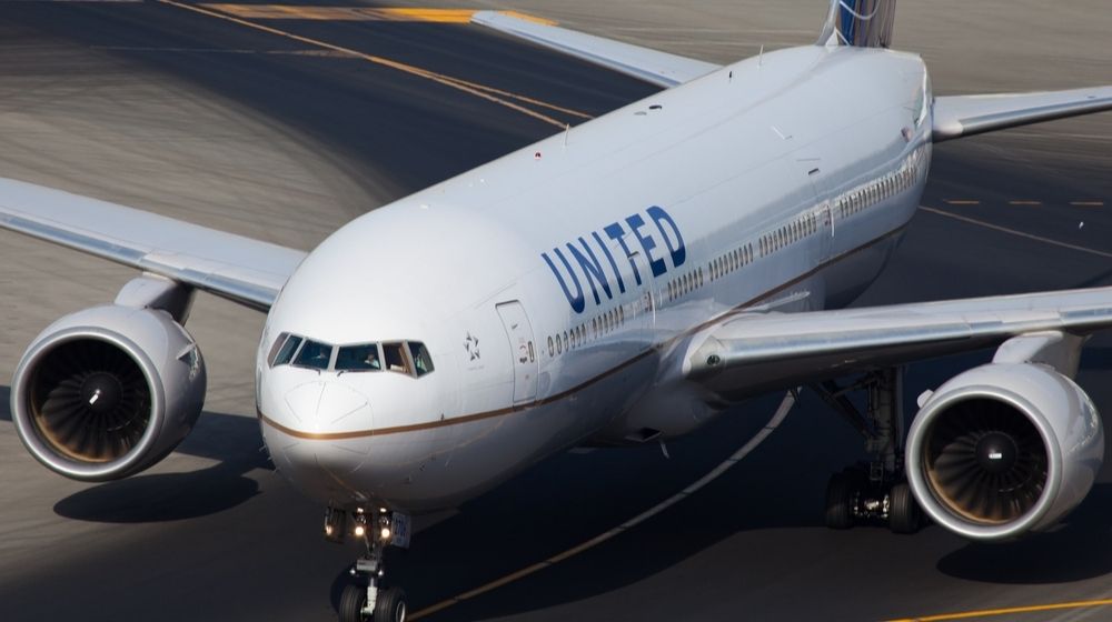 An American airline United B777 Plane | United Airlines No Longer Allows Face Masks with Exhaust Valves | Featured