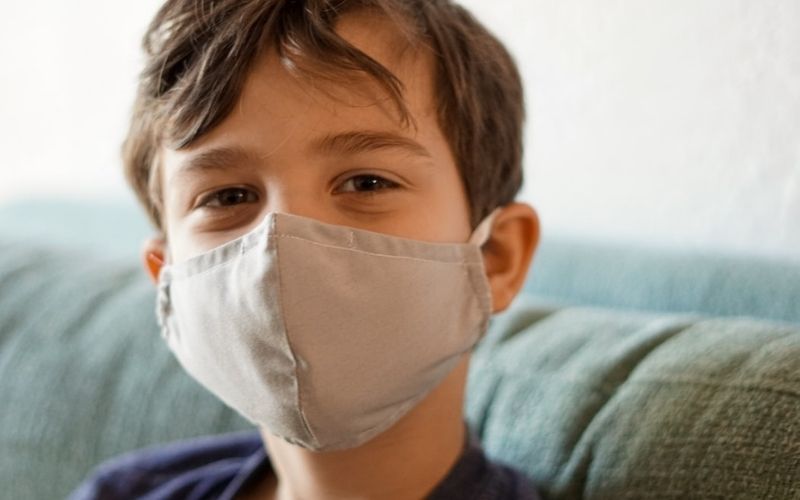 Boy Wearing Mask | Family Told Untested Kids Tested Positive