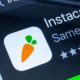 Smartphone with a Instacart Application | Walmart and Instacart Team Up for Same-Day Delivery Service | Featured