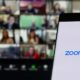 Smartphone Showing Zoom Application | Watchdog Sues Zoom Over False Claims on Privacy Protection | Featured