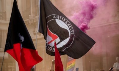 Antifa Flag Being Displayed at an Anti Fascist Demonstration | Senate Hearing Targets Alt-Left Terror Groups | Featured