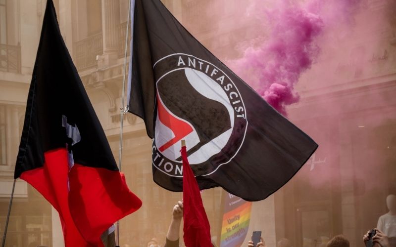Antifa Flag Being Displayed at an Anti Fascist Demonstration | Senate Hearing Targets Alt-Left Terror Groups | Featured