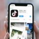TikTok Application Icon on Apple iPhone X | Trump Hinges TikTok’s Fate on Microsoft or Other Business Deal | Featured