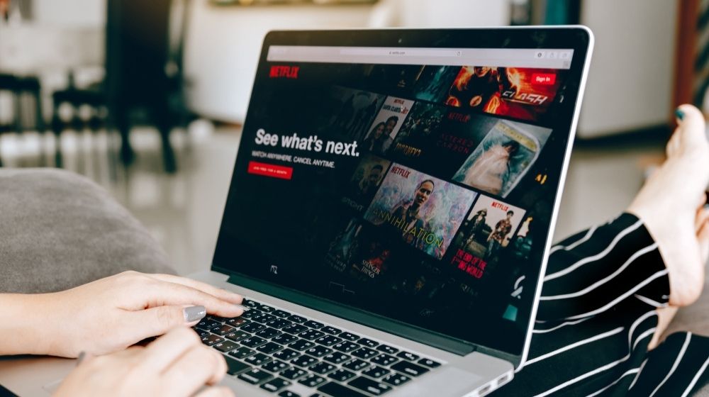Woman using Computer Laptop | Online Petition Demands Netflix to Remove Film That “Sexualizes an Eleven-Year-Old” | Featured