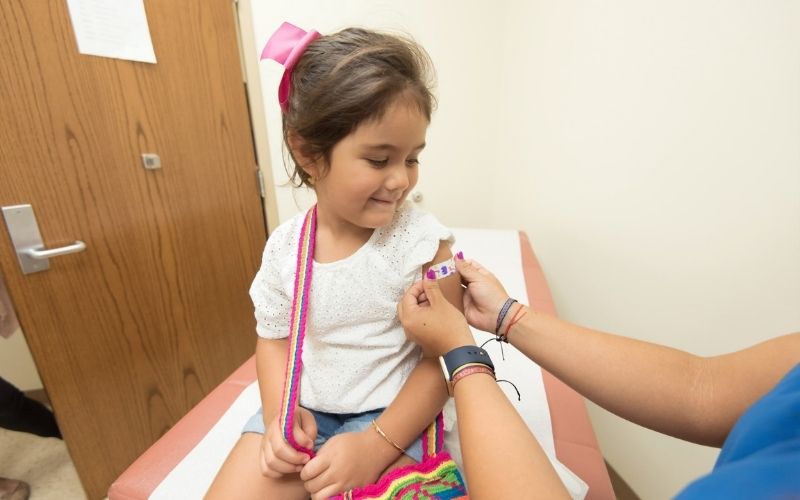 Girl Getting Vaccine | American Medical Association Says the Flu Vaccine This Year “Is More Important Than Ever”