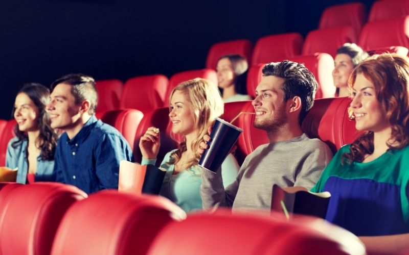 Group of Friends Happy Watching Movie | Cinemark to Open Theaters in San Francisco and Santa Clara, But There Will Be No Concessions