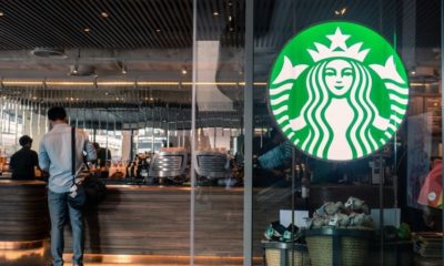 Starbucks Coffee Logo in Front of the Shop | Starbucks Enhances Corporate Workforce Diversity with New Goals | Featured
