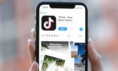 TikTok Application Icon on Apple iPhone X Screen | TikTok Works with Fact-Checking Partners to Prevent Election-Related Misinformation | Featured