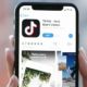 TikTok Application Icon on Apple iPhone X Screen | TikTok Works with Fact-Checking Partners to Prevent Election-Related Misinformation | Featured