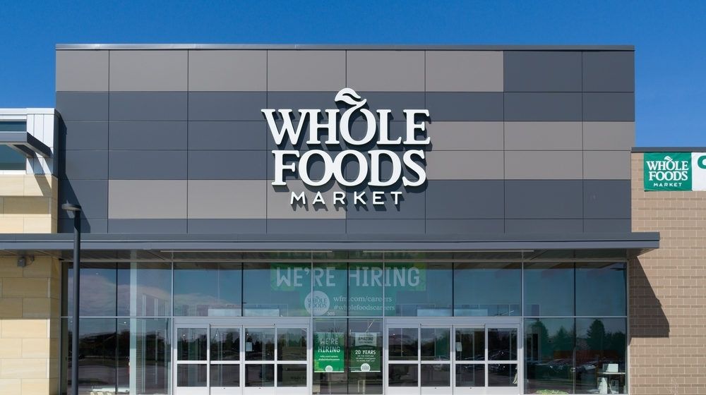Whole Foods Market Exterior and Logo | New Whole Foods Employee Dress Code Prohibits Busy Patterns and Visible Logos | Featured