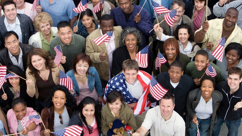 Crowd Holding American Flags | Dr. Paul Saba M.D. Advocates That President Trump’s Health Policies Save American Lives | Featured