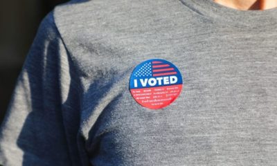 I Voted Sticker on Gray Shirt | 3 Days Post-Election: When Can We Expect a Result? | Featured