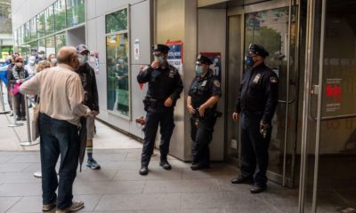NYPD Police Officers and Security Stand on Post at the Entrance to the Voting Place at Lincoln Center | Law Enforcement Braces for Election Day Unrest | Featured