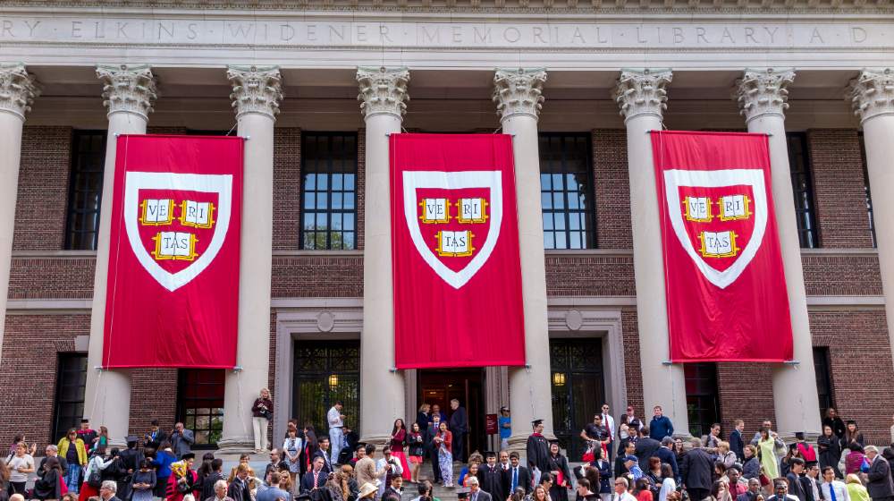 Students of Harvard University gather for their graduation ceremonies on Commencement Day-Ban Trump Officials from Harvard-ss-featured