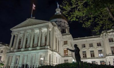 time exposure of outside entrance and grounds to the Georgia state Capital Building at night-Georgia Election Recount-ss-featured