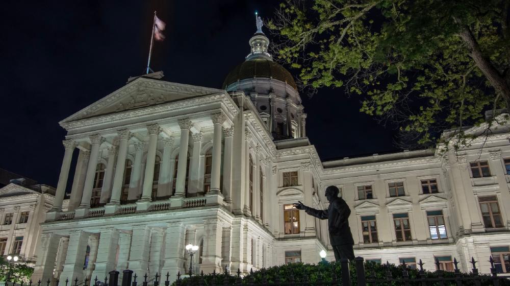 time exposure of outside entrance and grounds to the Georgia state Capital Building at night-Georgia Election Recount-ss-featured