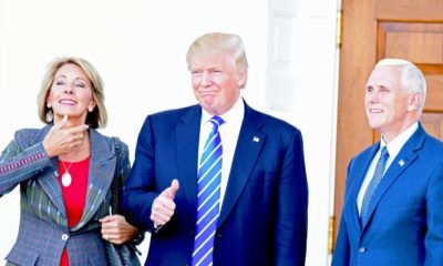 Betsy DeVos with President Trump and Vice President Pence-DeVos Tell Staffers- Resist Changes Under Biden-ss-Featured