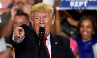 Donald Trump points and shouts at what he calls the dishonest media during a speech to mark 100 days in office at the Farm Show Complex and Expo Center-Trump Wants to Declassify-ss-featured