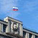 Russian flag on the parliament building in Moscow-US Raises Alarm As Russia Expands Rules On Foreign Agents-ss-featured