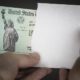 United States Treasury check with envelope arriving in mail-$2000 Stimulus Check-ss-featured