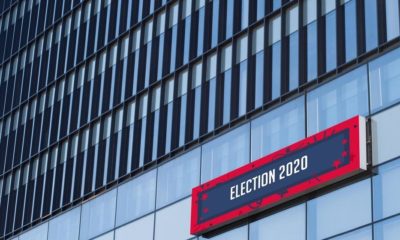 election 2020 sign on the side of a building-US- Barr dismisses need for election special counsel-ss-featured