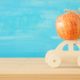 image of red fresh apple over wooden car. Rosh hashanah-Apple to Build Smart Cars-ss-featured