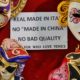A merchant in Venice informs tourists that the quality Venetian masks are made in Italy and not made in China-Goods Made by Free Nations-ss-featured