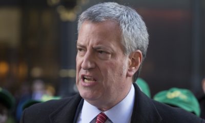 Mayor Bill de Blasio speaks at rally against GOP tax bill in front of Trump Tower on 5th Avenue-Cancel Trump Business Contracts-ss-featured