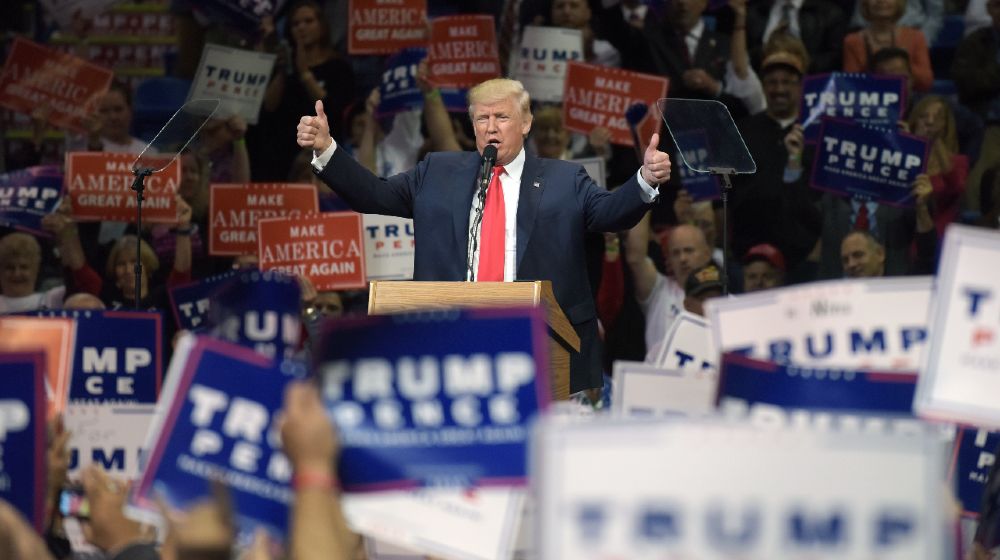 Republican Presidential nominee Donald Trump appears during a rally Oct. 10, 2016-Patriot Party-ss-featured