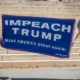 Two women holding an "impeach Trump" banner-Impeachment- House of Democrats Pushing for 25th Amendment invocation-ss-featured