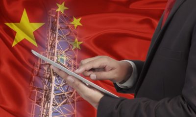business and mobility communications concept china Flag background-Delisting Chinese Companies-ss-featured