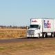 A FedEx Truck-FedEx Ready to Work with New Biden Policies-ss-Featured