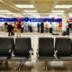 Delta counters at the Minneapolis-St Paul International Airport-Delta CEO Says Requiring Negative COVID-19 Test Is a 'Horrible Idea'-ss-Featured