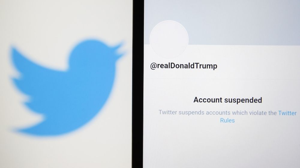 Twitter logo and monitor showing Trump's suspended account-ss-Featured