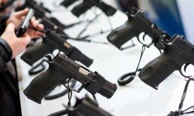 Gun Display Stamds=Asian-Americans Are Buying More Guns for Protection After Hate Crimes-ss-Featured