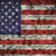 Many US 100 dollars, USA flag-Dalio Advises-ss-featured