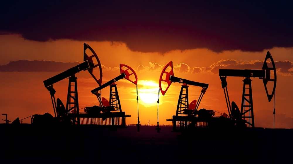 Oil field at sunset-14 States are suing Biden Administration Over Leasing Pause for Public Lands Drilling-ss-Featured