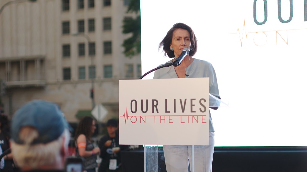 demonstration for health care for all on Freedom Plaza, with Nancy Pelosi as guest-Pelosi Blames-ss-featured