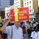 fast food workers and their supporters marched along 8th Ave calling for an increase in the minimum wage-minimum wage bump-ss-featured