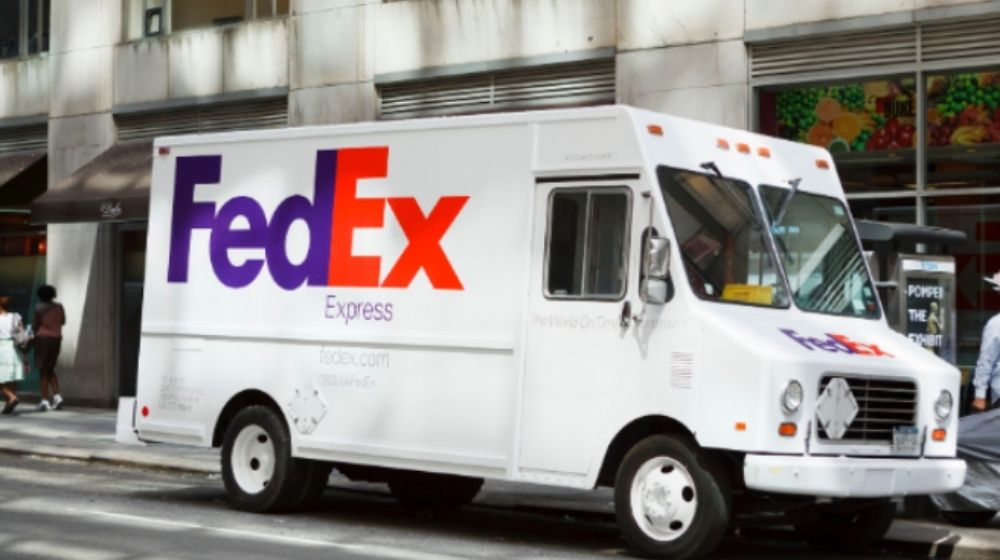 A FedEx truck-Police Say FedEx Gunman Shot 8 Before Committing Suicide-ss-Featured