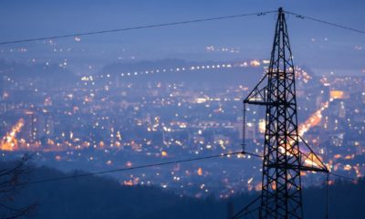 High-power-electricity-poles-in-urban-area.-Energy-supply-distribution-of-energy-transmitting-energy-energy-transmission-high-voltage-supply | Biden Rushes to Protect Power Grid As Hacking Threats Grow | Featured