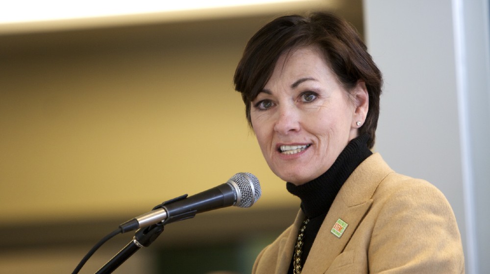 Iowa Lieutenant Governor Kim Reynolds addresses the audience at the dedication of the new Preschool Learning Center | Iowa Say No To House Migrant Kids: ‘It’s Biden’s Problem’| featured