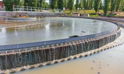 Modern wastewater treatment plant. Round tanks for sedimentation of dirty water | water woes | Featured