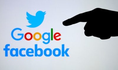 Silhouette of hand pointing to logos of big tech companies-Indiana AG Starts Full Investigation on 5 Big Tech Companies for their Conservative Content Censorship-ss-Featured
