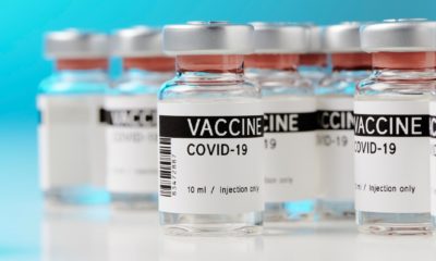 ampoules with Covid-19 vaccine on a laboratory bench-Vaccine Surplus-ss-featured
