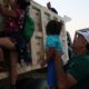 A Honduran man fleeing poverty and gang violence in the second caravan to the U.S.-Migrant Kids-SS-Featured