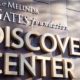 Bill and Melinda Gates Foundation Discovery Center sign on the exterior of the philanthropic headquarters building in Seattle | Melinda Gates Is Now A Billionaire After Her Divorce | Featured