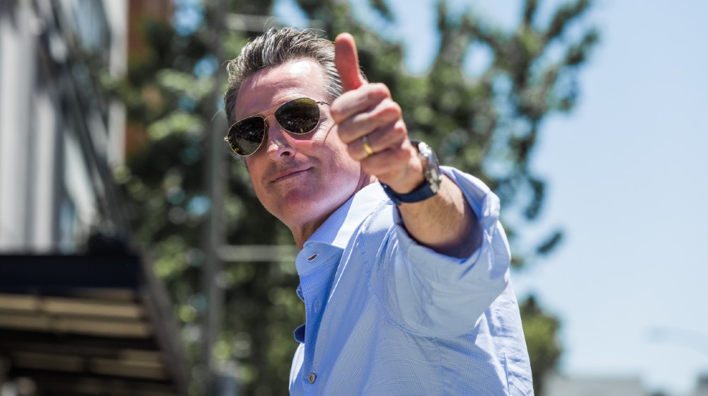 California Governor Gavin Newsom (then Lieutenant Governor) riding in the Golden State Warriors Parade in Oakland | Newsom Fights Recall By Unveiling Tax Rebate Plan | Featured